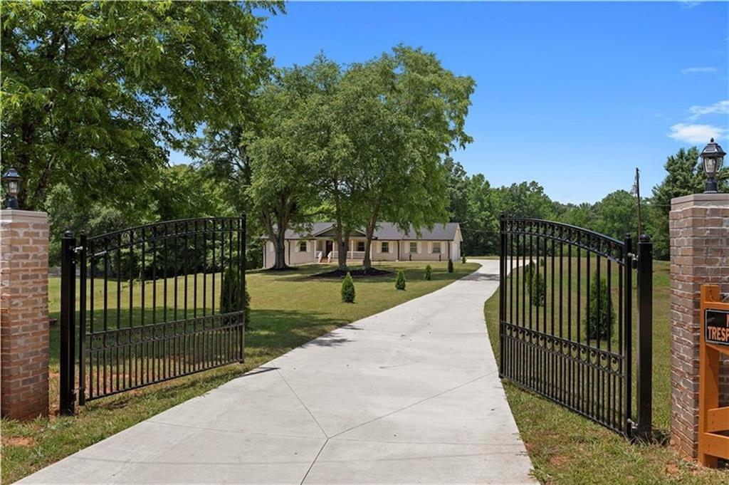 5245 Stonewall Tell Road Atlanta, GA 30349 - Photo 1 of 15