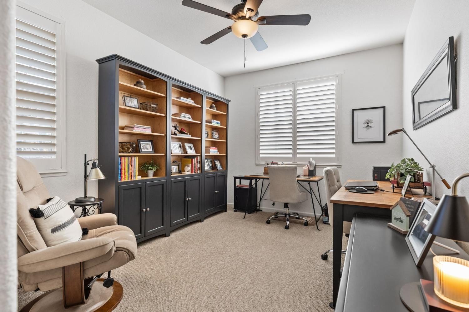 1107 Hudson Circle Lincoln, CA 95648 - Photo 26 of 51 Secondary bedroom features a lighted ceiling fan, shutters, and patterned Berber carpet