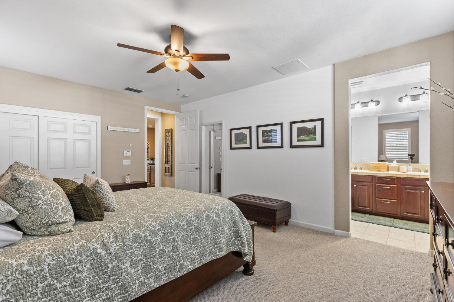 1107 Hudson Circle Lincoln, CA 95648 - Photo 37 of 51 The spacious primary bedroom features a lighted ceiling fan and two separate closets