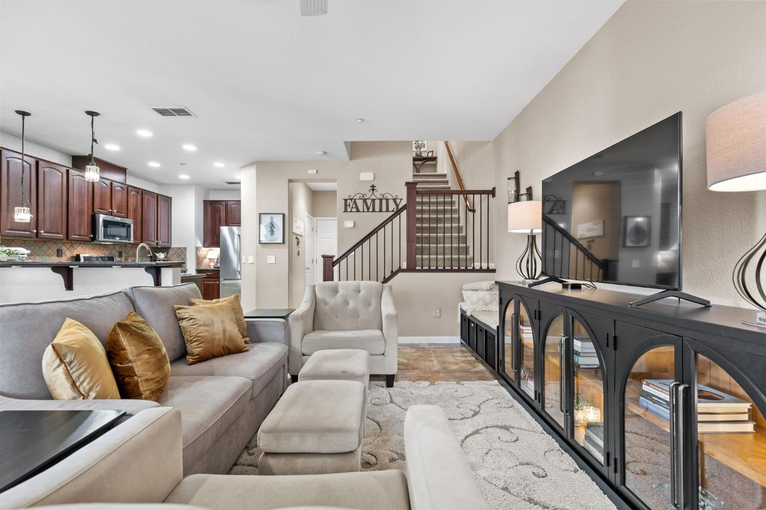 1107 Hudson Circle Lincoln, CA 95648 - Photo 6 of 51 a living room with furniture and a flat screen tv