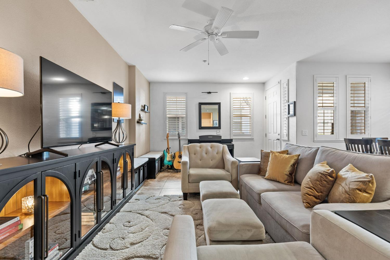 1107 Hudson Circle Lincoln, CA 95648 - Photo 7 of 51 a living room with furniture and a flat screen tv