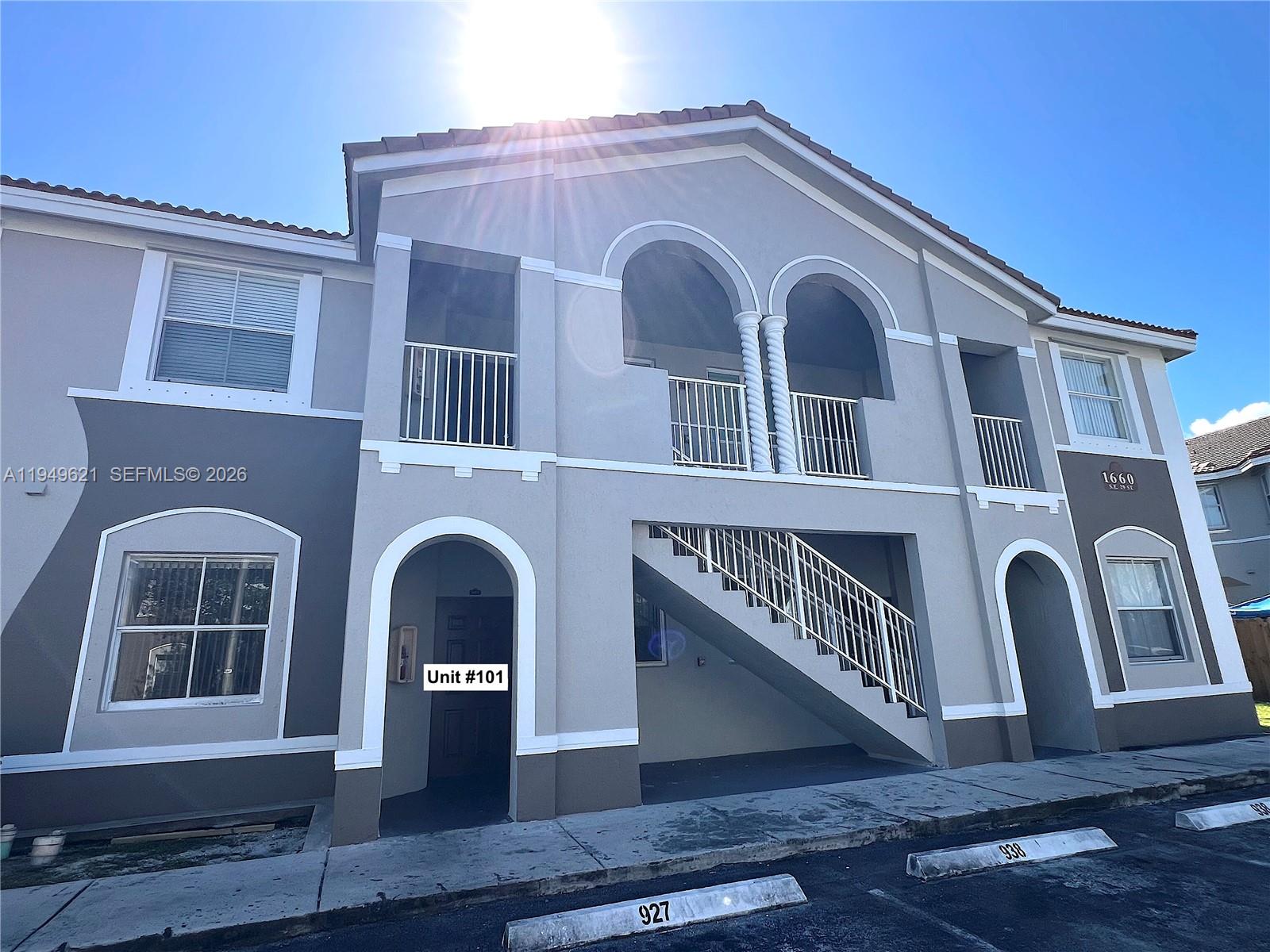 1660 Southeast 29th Street, Unit 101 Homestead, FL 33035 - Photo 3 of 18 a front view of a house