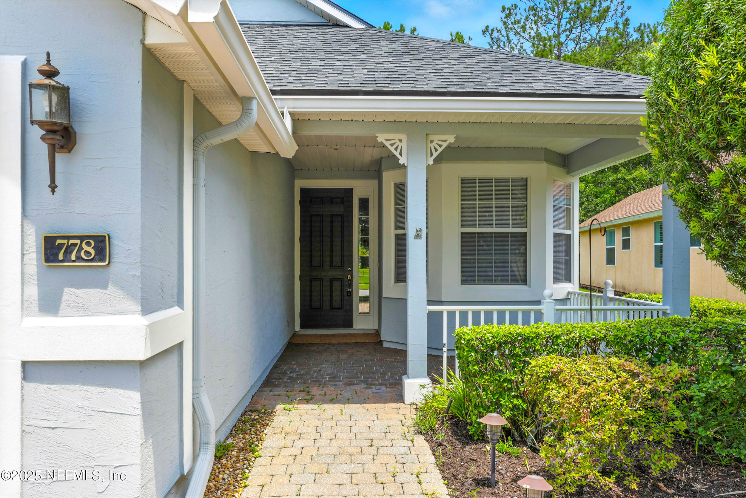 778 Copperhead Circle St. Augustine, FL 32092 - Photo 2 of 43 a view of a entryway door front of house