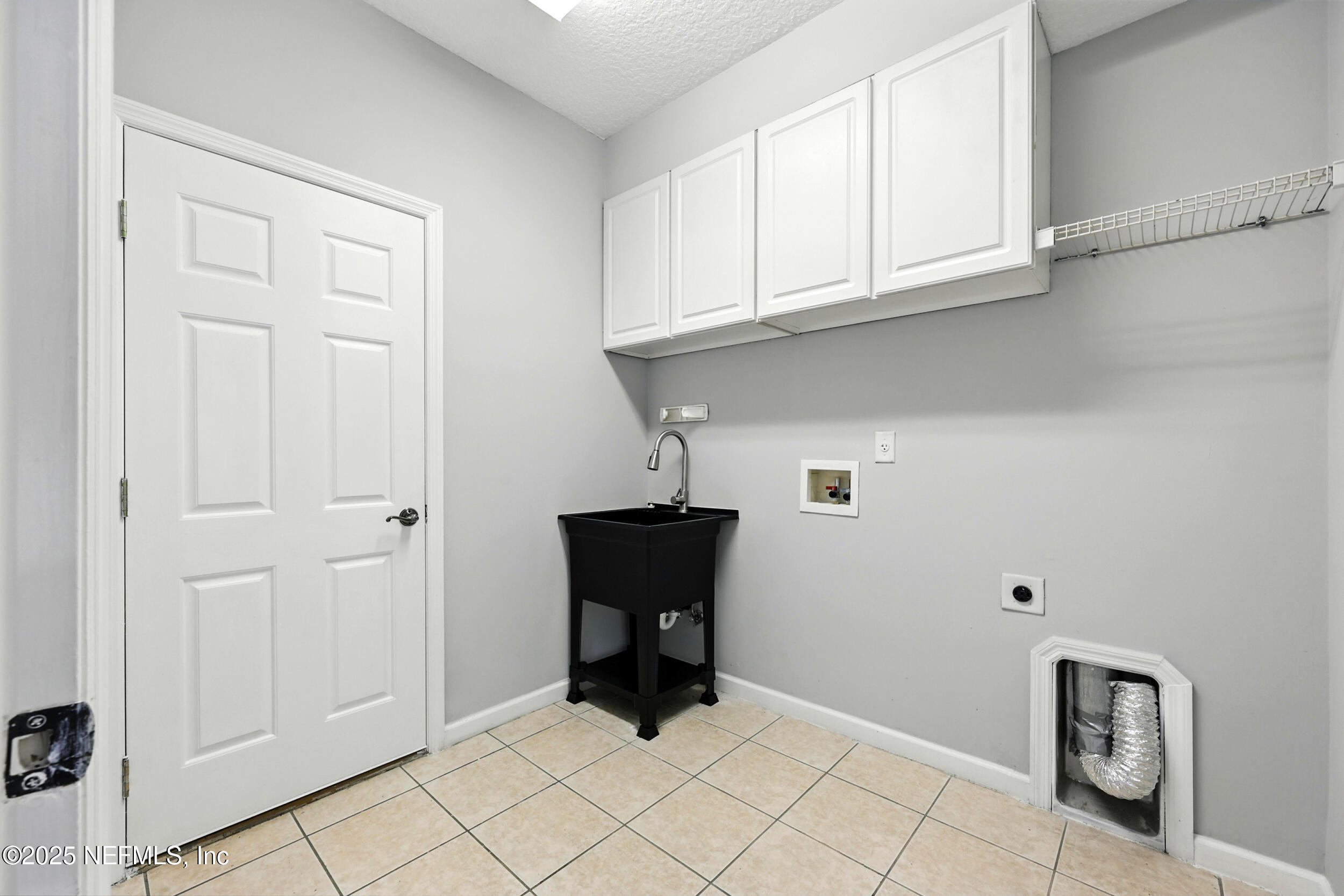 778 Copperhead Circle St. Augustine, FL 32092 - Photo 21 of 43 a view of an entryway with cabinet