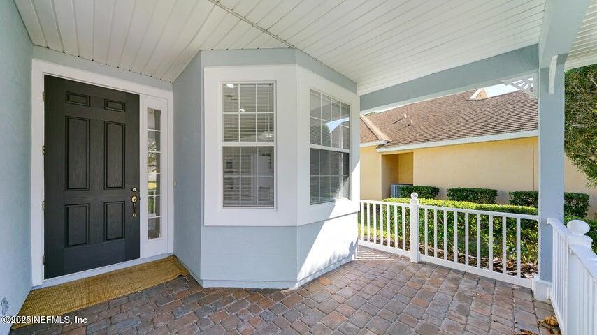 778 Copperhead Circle St. Augustine, FL 32092 - Photo 3 of 43 a view of a house with a porch
