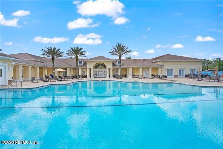 778 Copperhead Circle St. Augustine, FL 32092 - Photo 35 of 43 a view of house with outdoor space and swimming pool