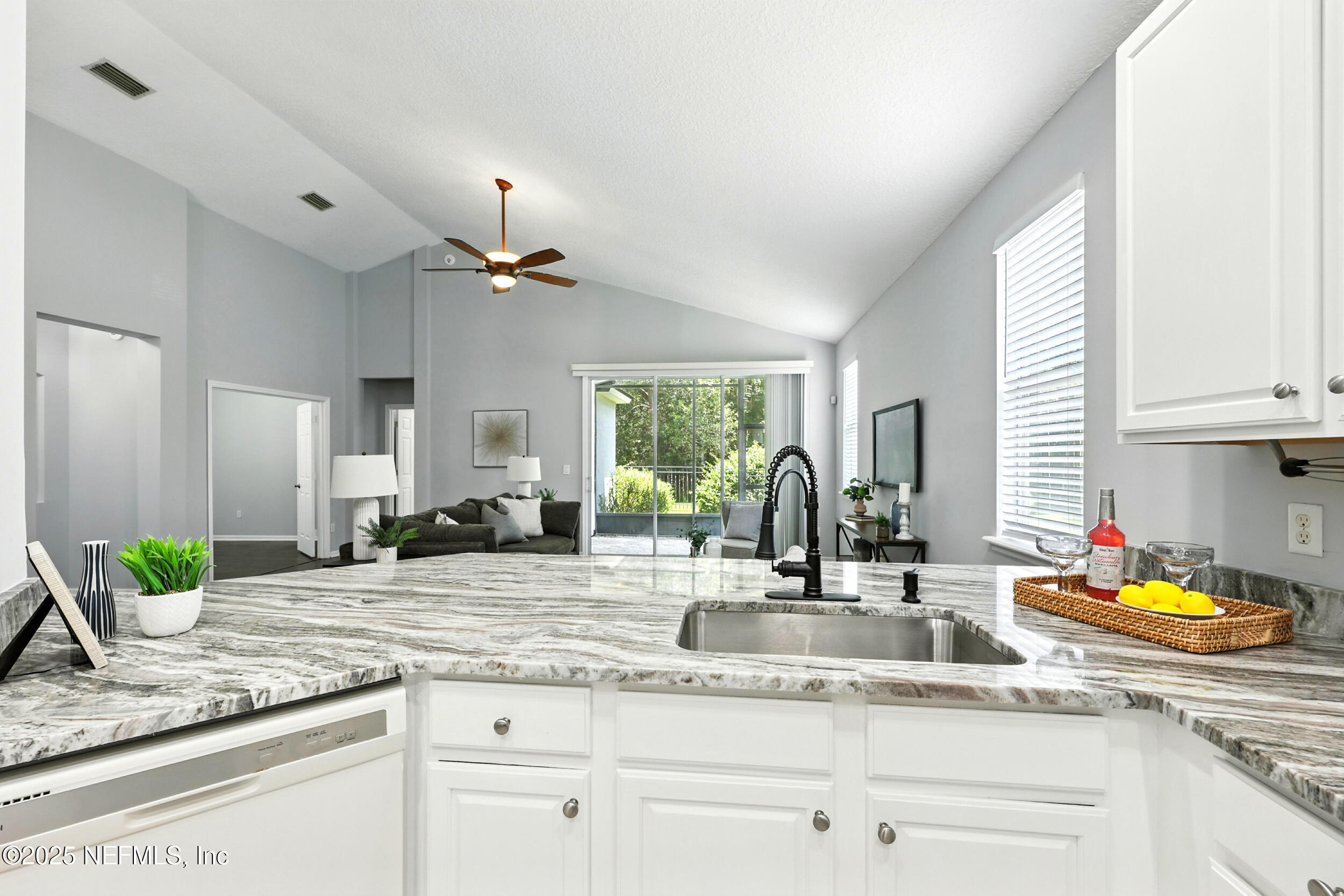 778 Copperhead Circle St. Augustine, FL 32092 - Photo 7 of 43 a kitchen with sink and window