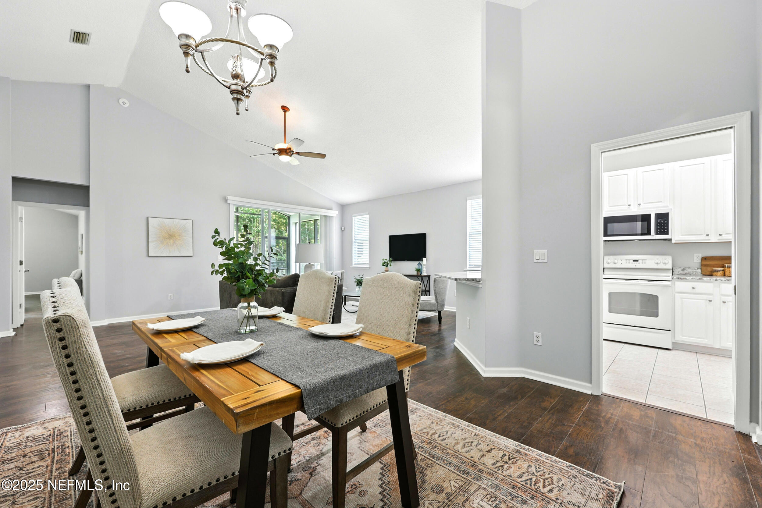 778 Copperhead Circle St. Augustine, FL 32092 - Photo 9 of 43 a view of a dining room with furniture window and wooden floor