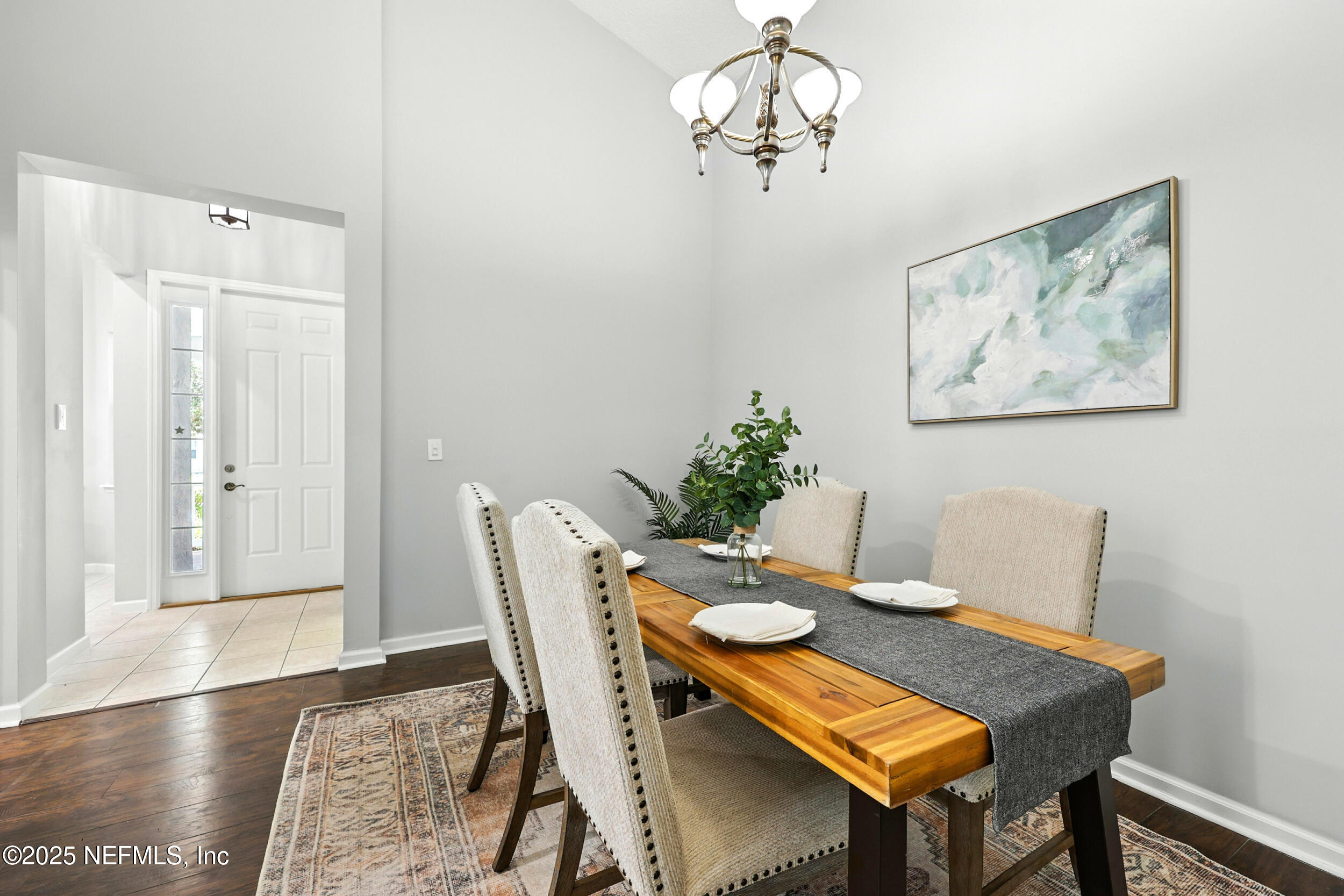 778 Copperhead Circle St. Augustine, FL 32092 - Photo 10 of 43 a view of a dining room with furniture and wooden floor