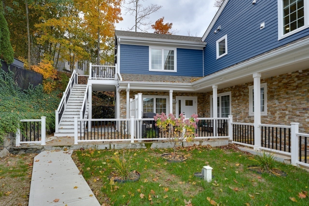 17 School Street, Unit A Hudson, MA 01749 - Photo 16 of 19 front view of house with a yard