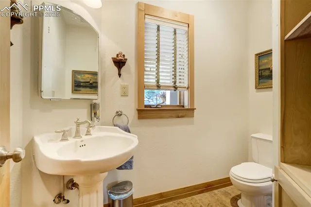 a bathroom with a sink and a toilet