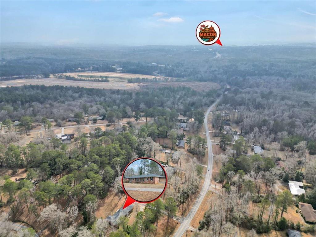 a view of a wooden floor and table in a room