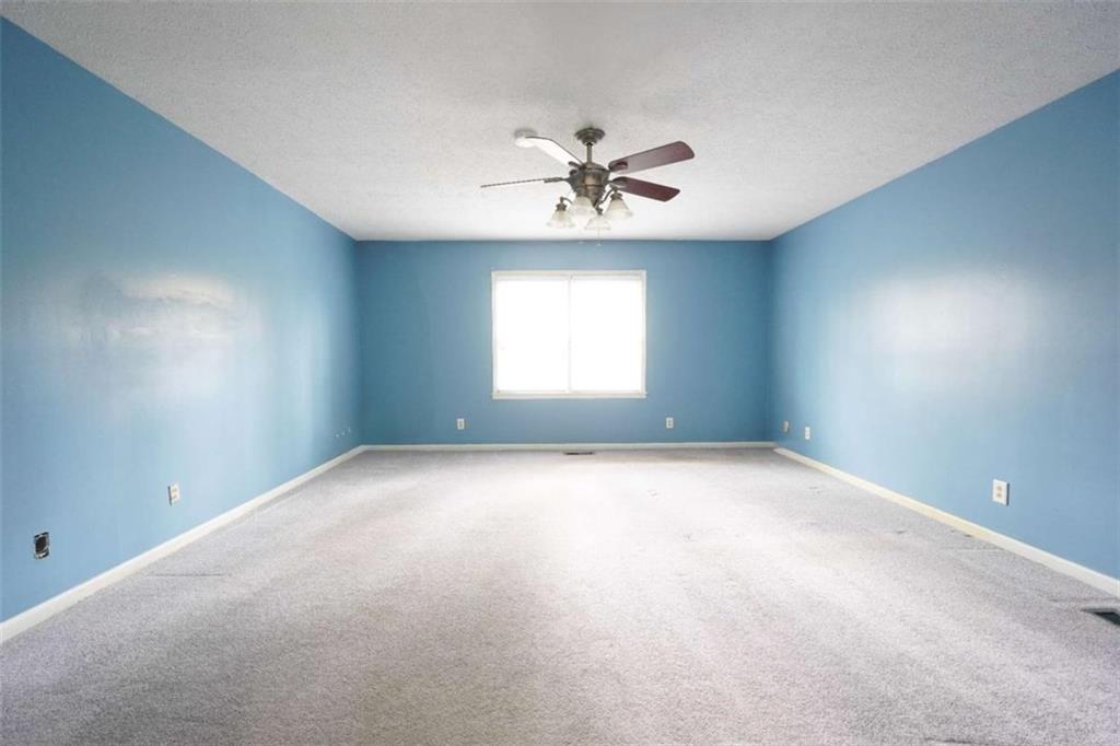 2058 Graham Road Macon, GA 31211 - Photo 15 of 37 a view of a room with windows and ceiling fan