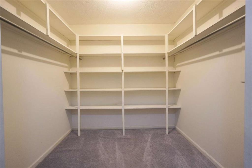 2058 Graham Road Macon, GA 31211 - Photo 19 of 37 a view of an empty walk in closet