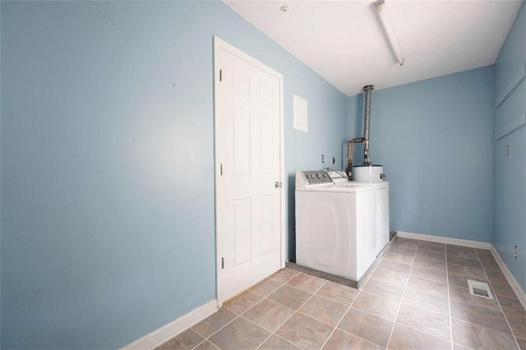 2058 Graham Road Macon, GA 31211 - Photo 24 of 37 a view of a room with storage and utility