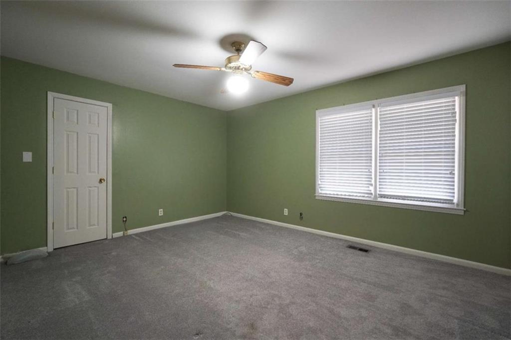 2058 Graham Road Macon, GA 31211 - Photo 26 of 37 a view of an empty room with a window