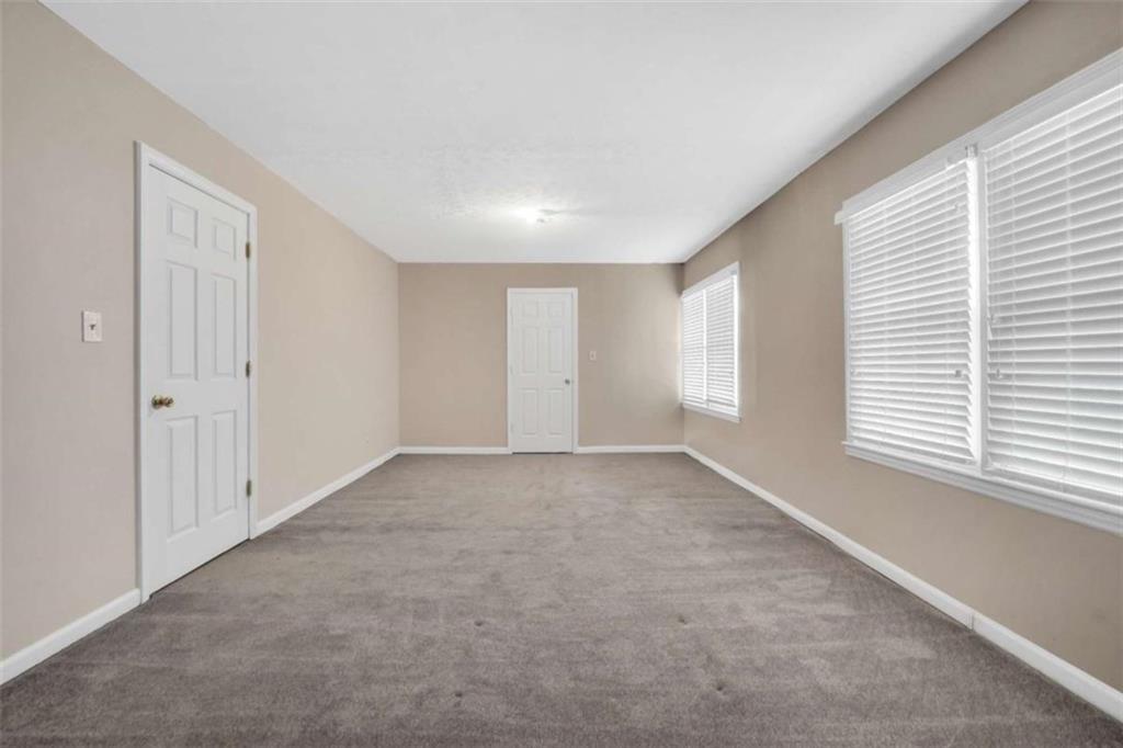 2058 Graham Road Macon, GA 31211 - Photo 30 of 37 a view of an empty room with a window