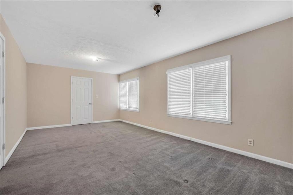 2058 Graham Road Macon, GA 31211 - Photo 31 of 37 an empty room with windows