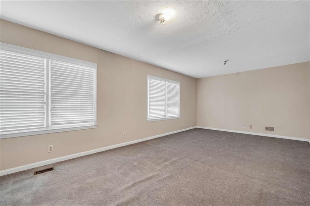 2058 Graham Road Macon, GA 31211 - Photo 32 of 37 an empty room with a window