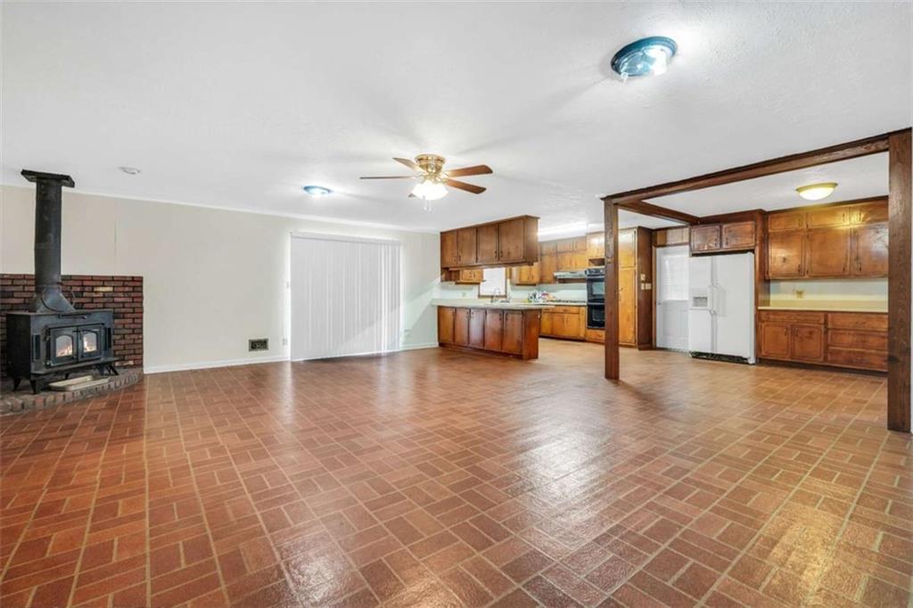 2058 Graham Road Macon, GA 31211 - Photo 4 of 37 a view of a livingroom with furniture and a fireplace