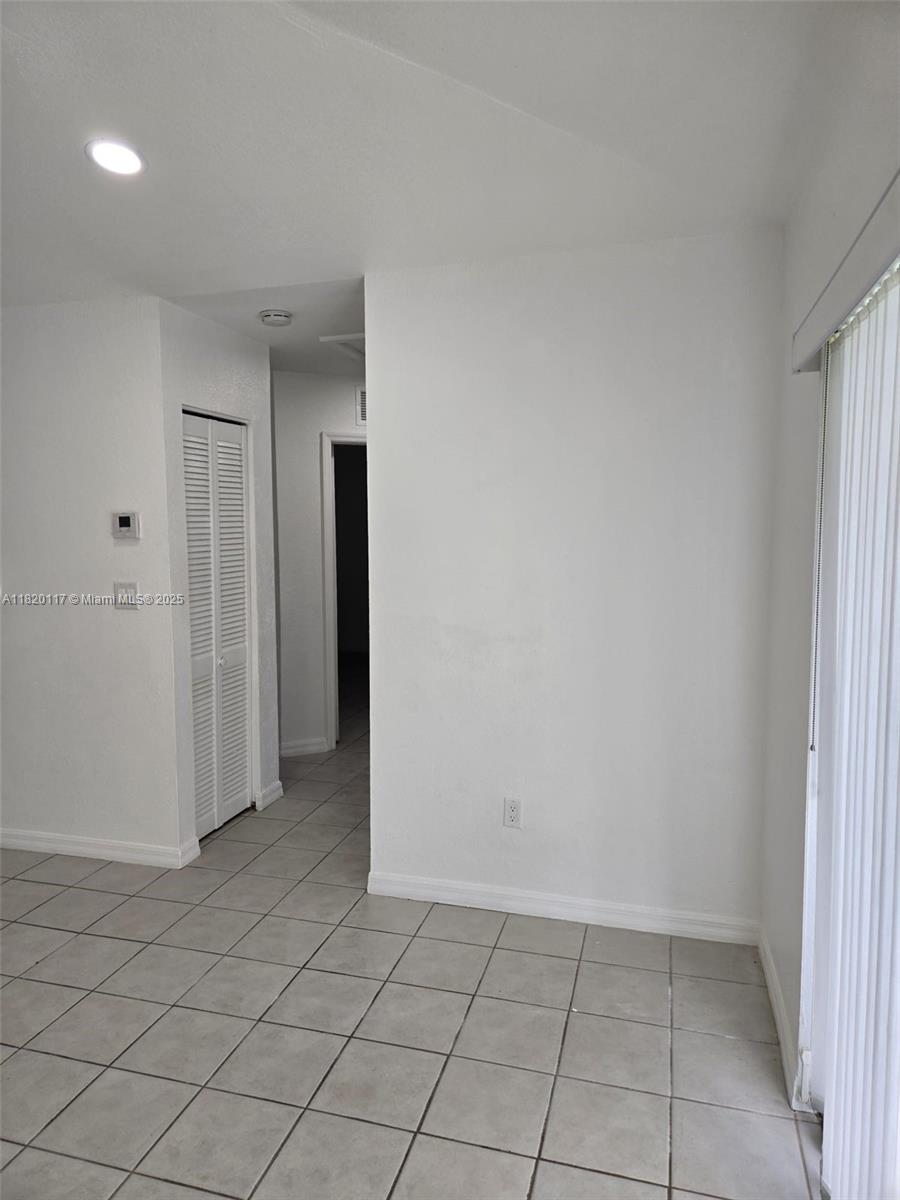 20137 Southwest 88th Court, Unit 20135 Cutler Bay, FL 33189 - Photo 17 of 33 an empty room with a bathroom