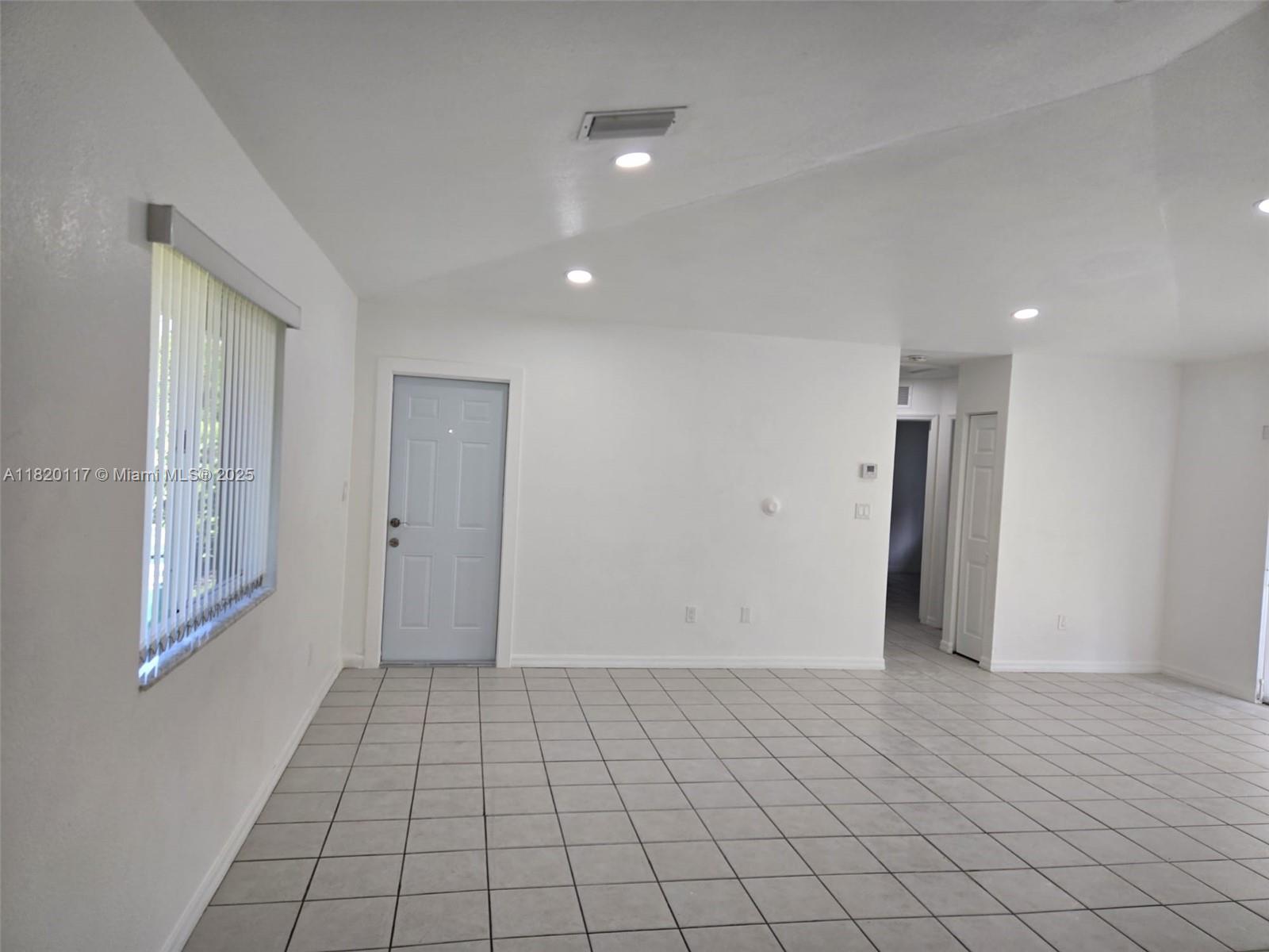 20137 Southwest 88th Court, Unit 20135 Cutler Bay, FL 33189 - Photo 19 of 33 a view of an empty room