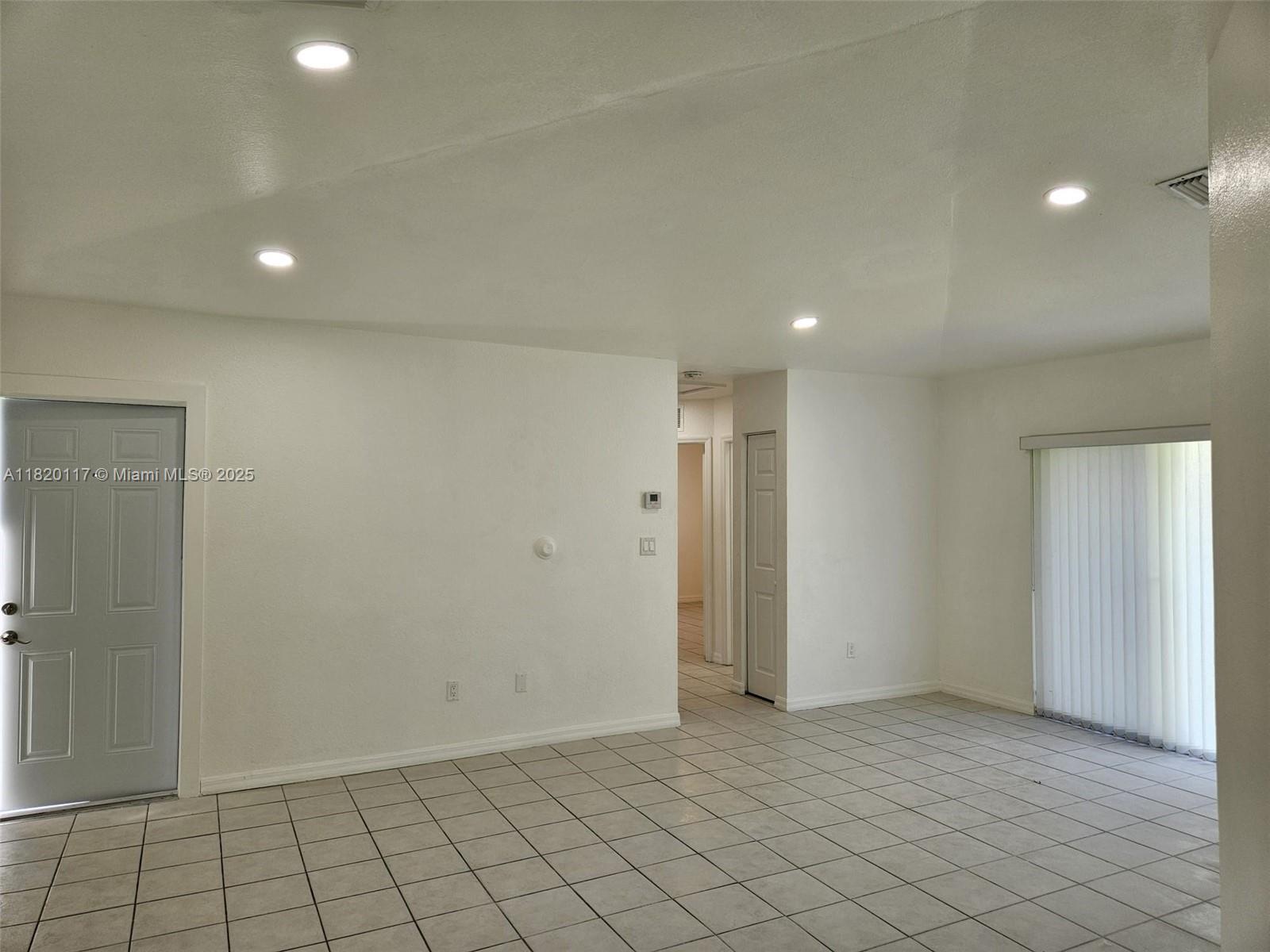 20137 Southwest 88th Court, Unit 20135 Cutler Bay, FL 33189 - Photo 20 of 33 an empty room with white walls