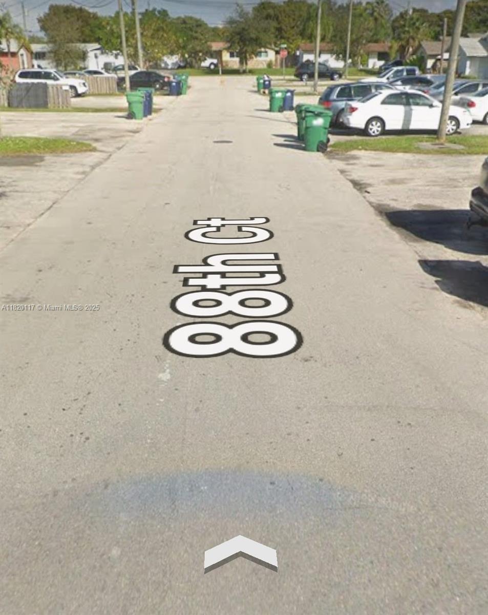 20137 Southwest 88th Court, Unit 20135 Cutler Bay, FL 33189 - Photo 3 of 33 a view of a swimming pool and a outdoor space