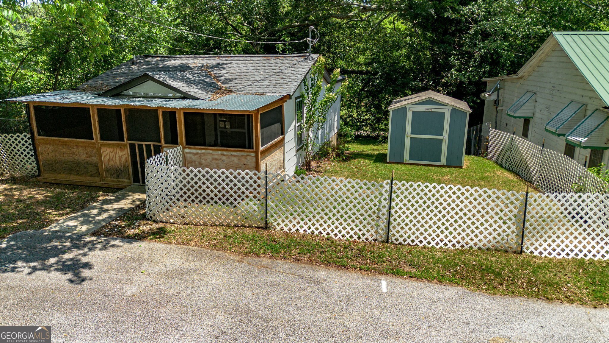 128 Branch Street Toccoa, GA 30577 - Photo 16 of 38 a front view of a house with a yard