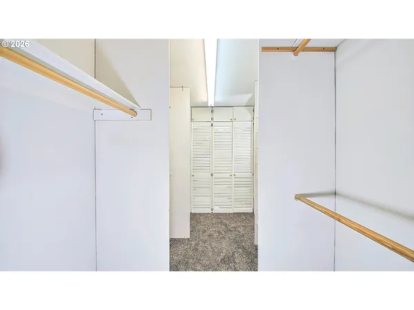 a open living room with a wooden floor