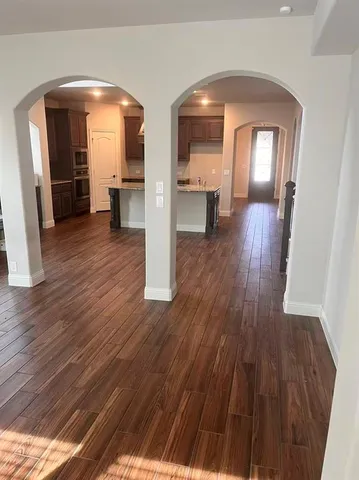 a view of livingroom with furniture and wooden floor