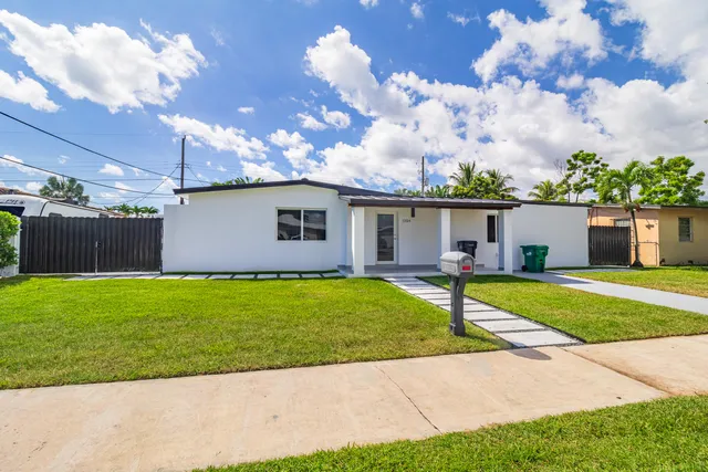 $995,000 | 11014 Westwood Lake Drive, Miami, FL 33165