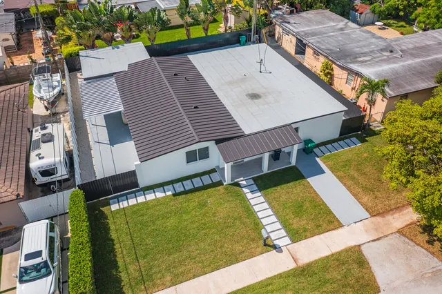 $995,000 | 11014 Westwood Lake Drive, Miami, FL 33165