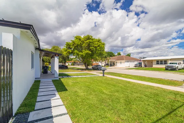 $995,000 | 11014 Westwood Lake Drive, Miami, FL 33165