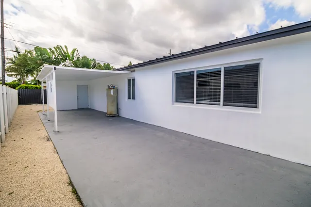 $995,000 | 11014 Westwood Lake Drive, Miami, FL 33165