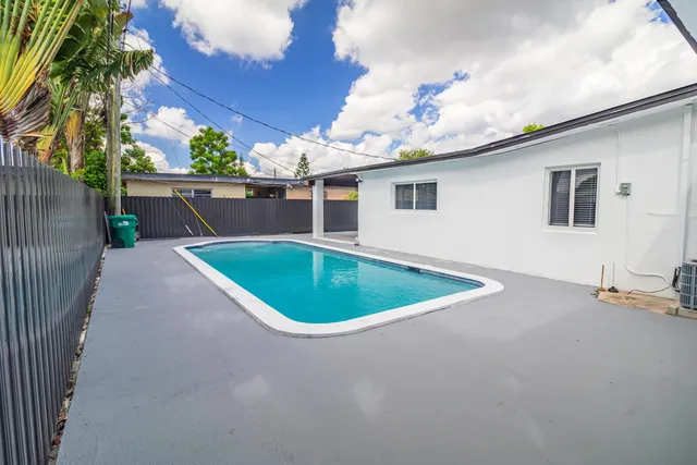 $995,000 | 11014 Westwood Lake Drive, Miami, FL 33165