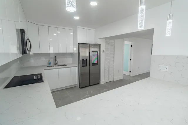 $995,000 | 11014 Westwood Lake Drive, Miami, FL 33165