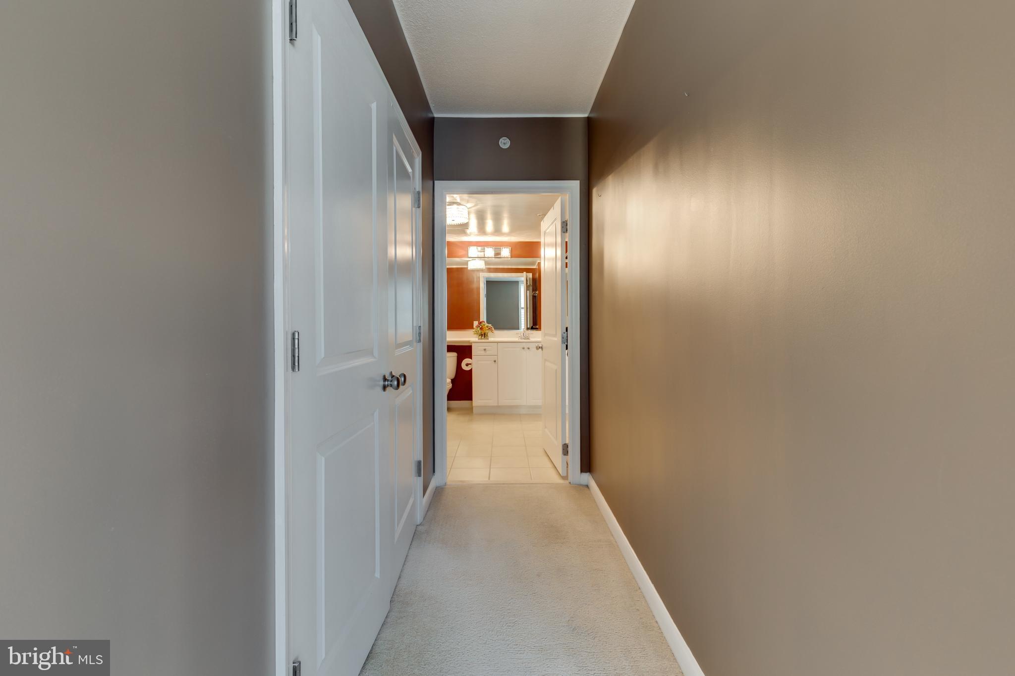 851 North Glebe Road, Unit 1020 Arlington, VA 22203 - Photo 21 of 52 Hall from Bedroom to Attached Bath
