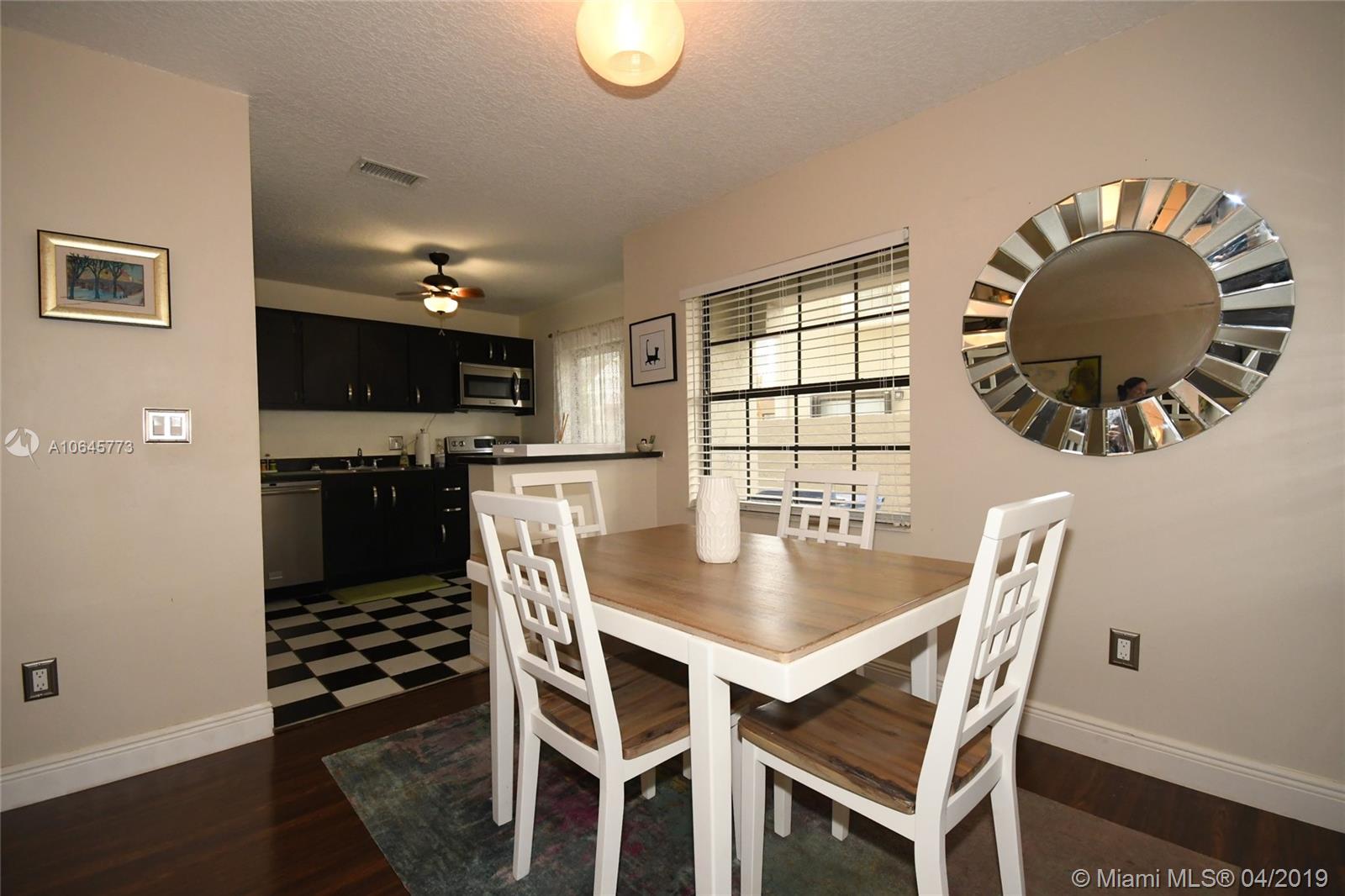 10475 Southwest 153rd Court, Unit 8 Miami, FL 33196 - Photo 19 of 65 Dining Room w/Kitchen Pass-Thru & Snack Counter in background