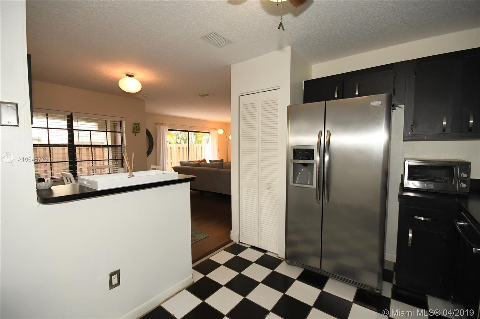10475 Southwest 153rd Court, Unit 8 Miami, FL 33196 - Photo 23 of 65 Kitchen to Dining & Living Rooms