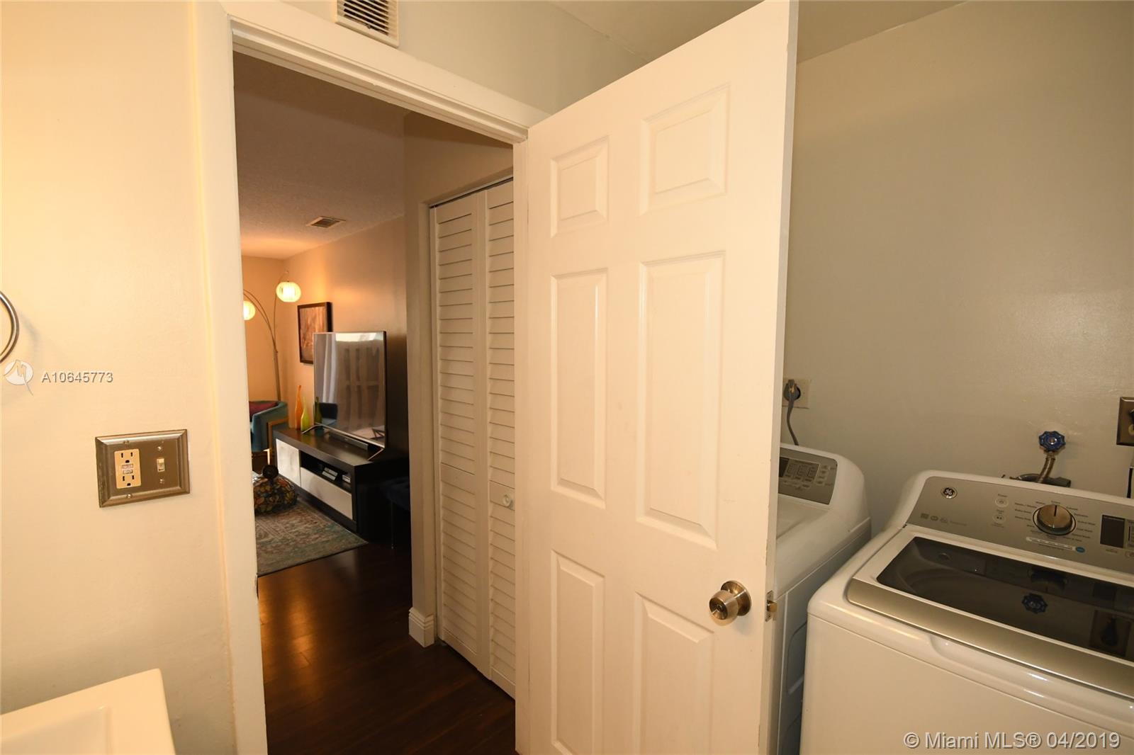 10475 Southwest 153rd Court, Unit 8 Miami, FL 33196 - Photo 26 of 65 1/2 Bath to Living Room