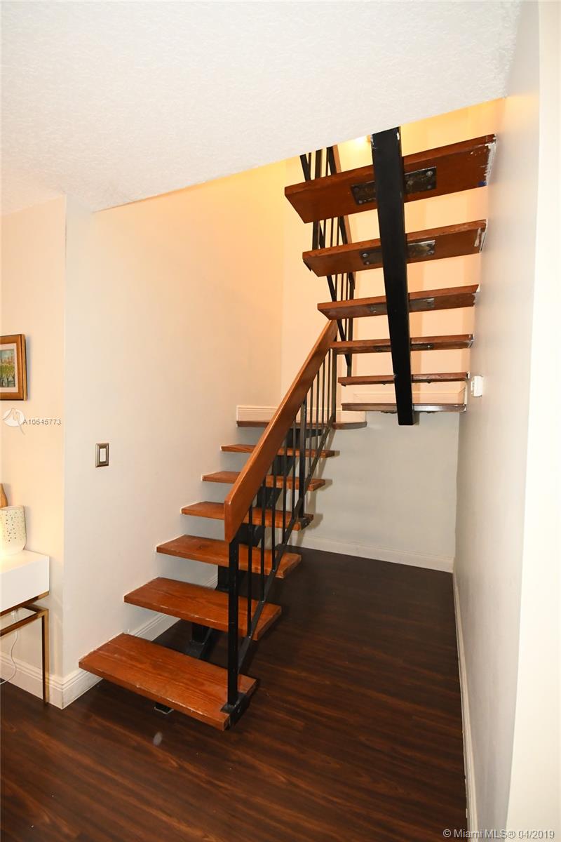10475 Southwest 153rd Court, Unit 8 Miami, FL 33196 - Photo 28 of 65 Open Stairway