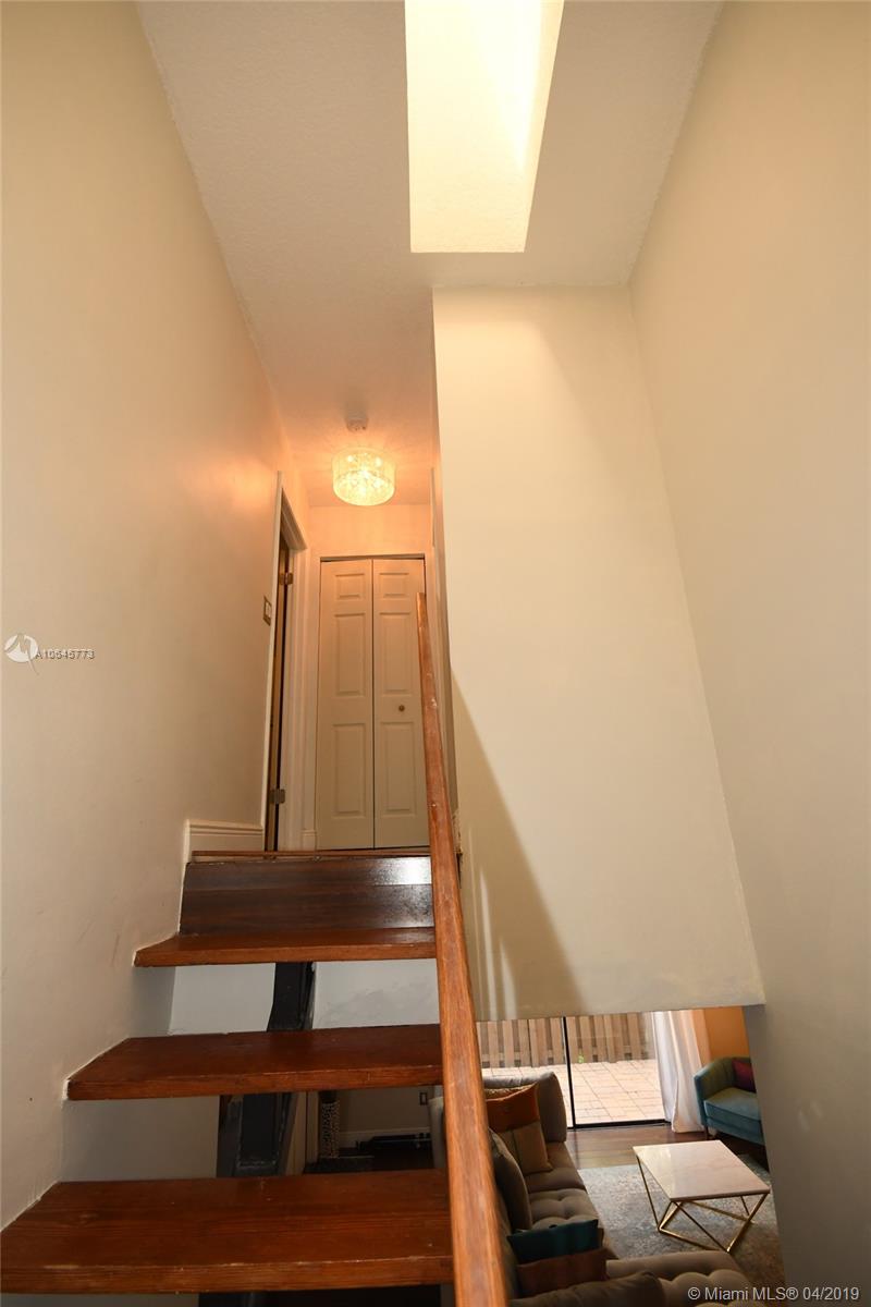 10475 Southwest 153rd Court, Unit 8 Miami, FL 33196 - Photo 31 of 65 Stairway Landing to 2nd Floor