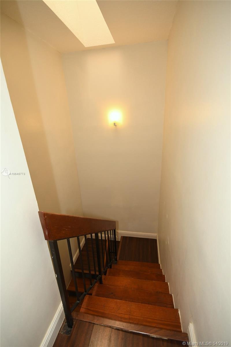 10475 Southwest 153rd Court, Unit 8 Miami, FL 33196 - Photo 32 of 65 Looking down Stairway