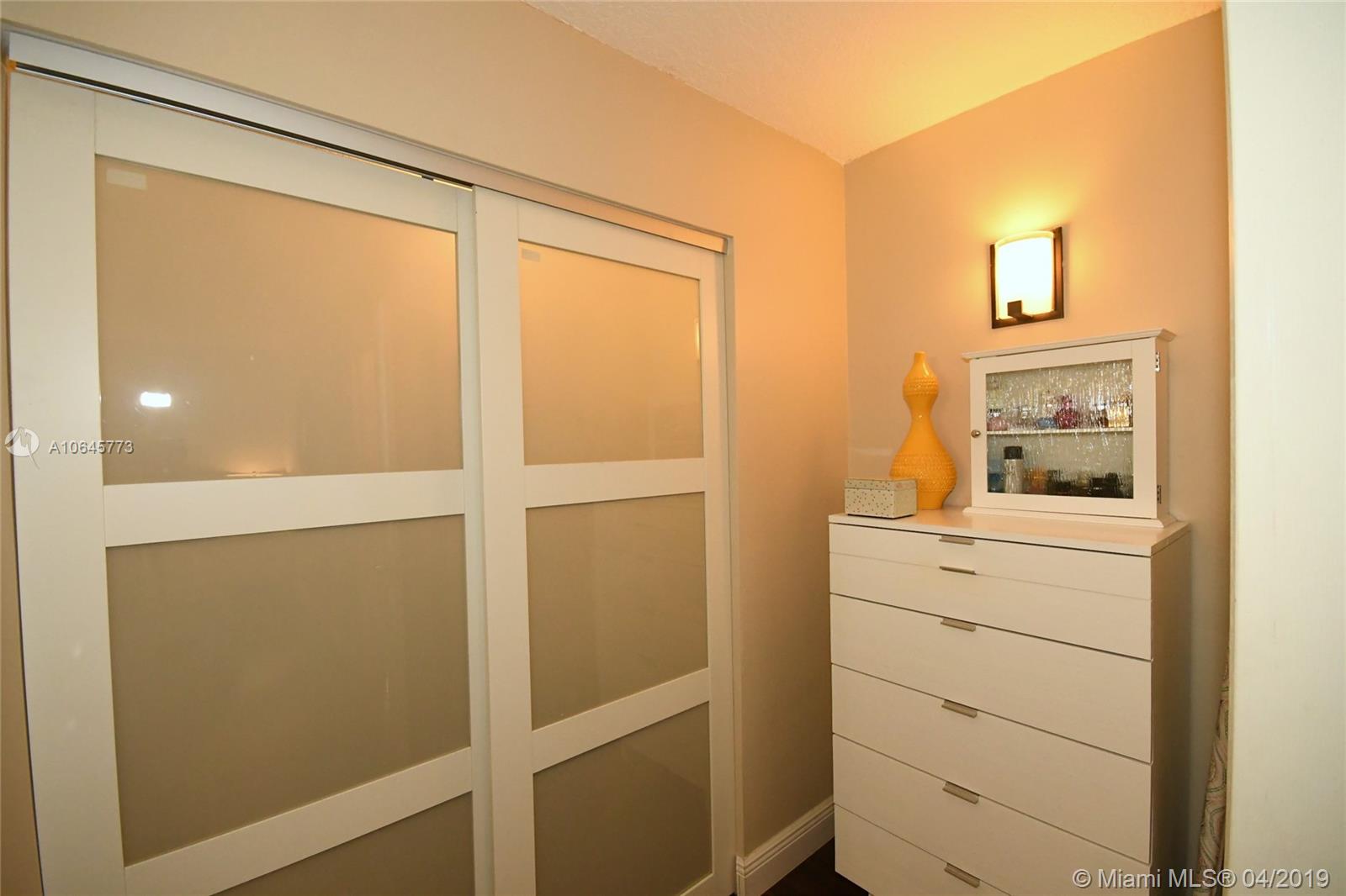10475 Southwest 153rd Court, Unit 8 Miami, FL 33196 - Photo 41 of 65 Master Bedroom vestibule for dressing area & dresser