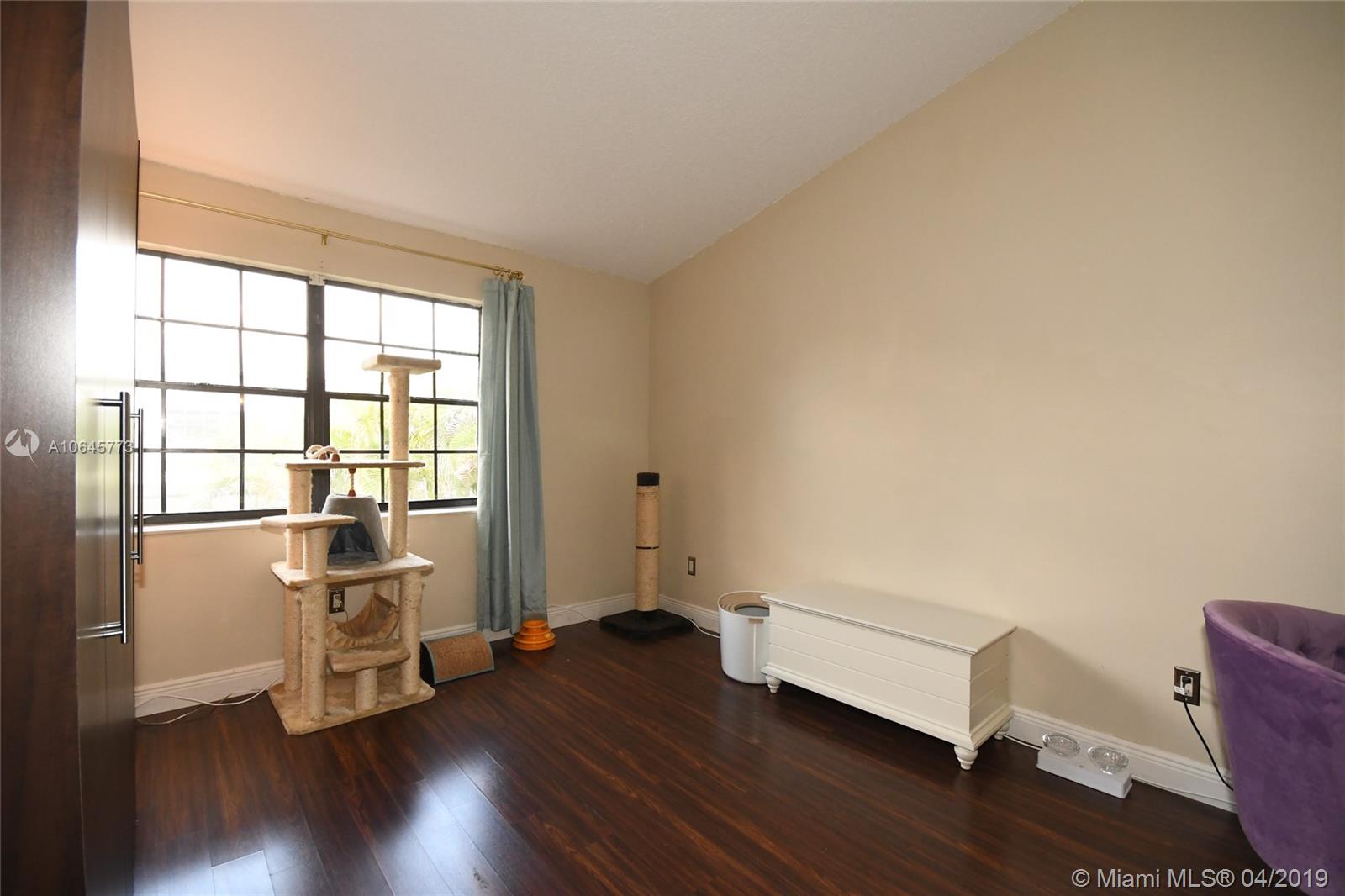 10475 Southwest 153rd Court, Unit 8 Miami, FL 33196 - Photo 45 of 65 Master Bedroom #2. Note Vaulted Ceilings