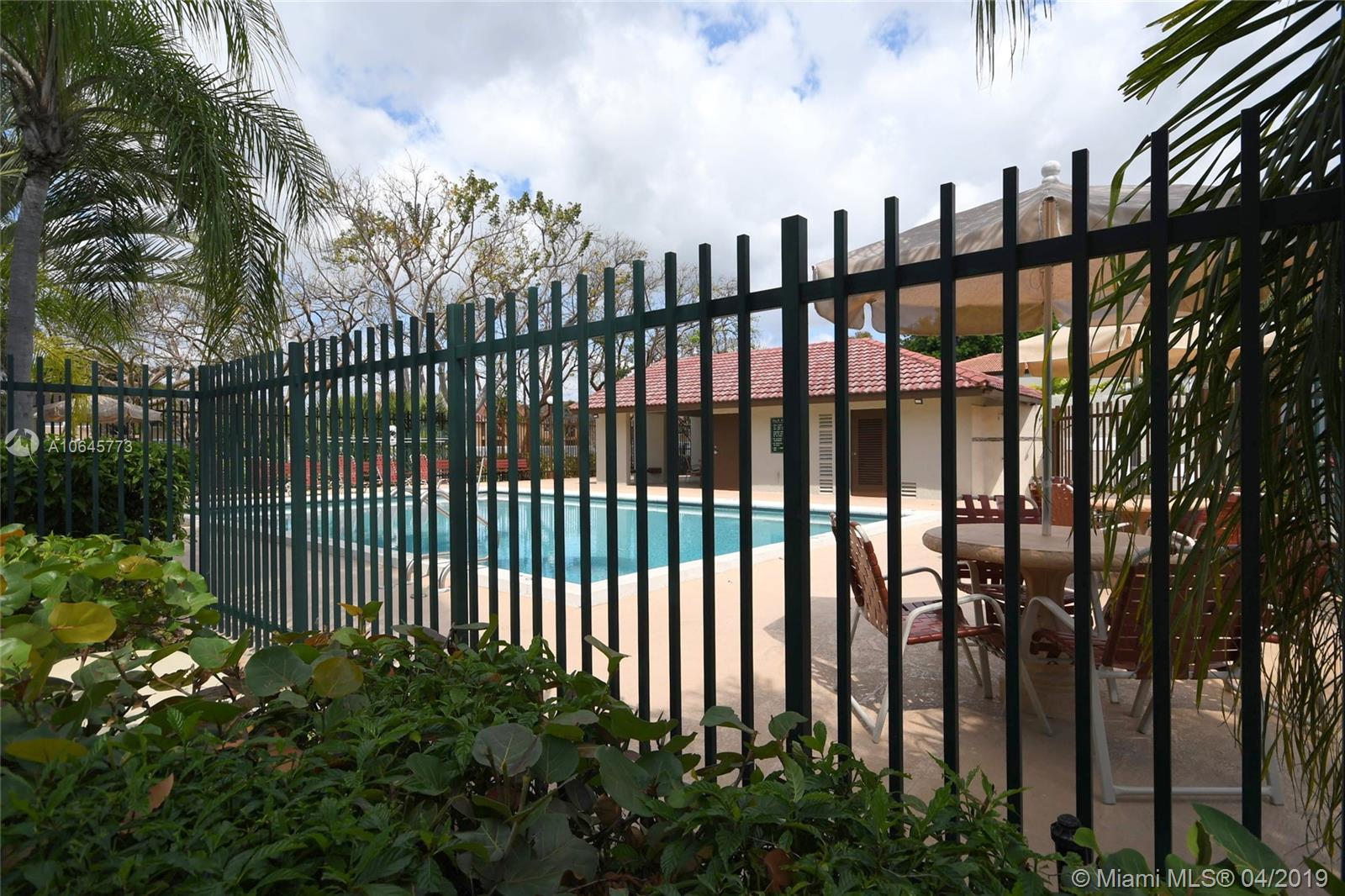 10475 Southwest 153rd Court, Unit 8 Miami, FL 33196 - Photo 53 of 65 Gated Community Pool & Cabana Area