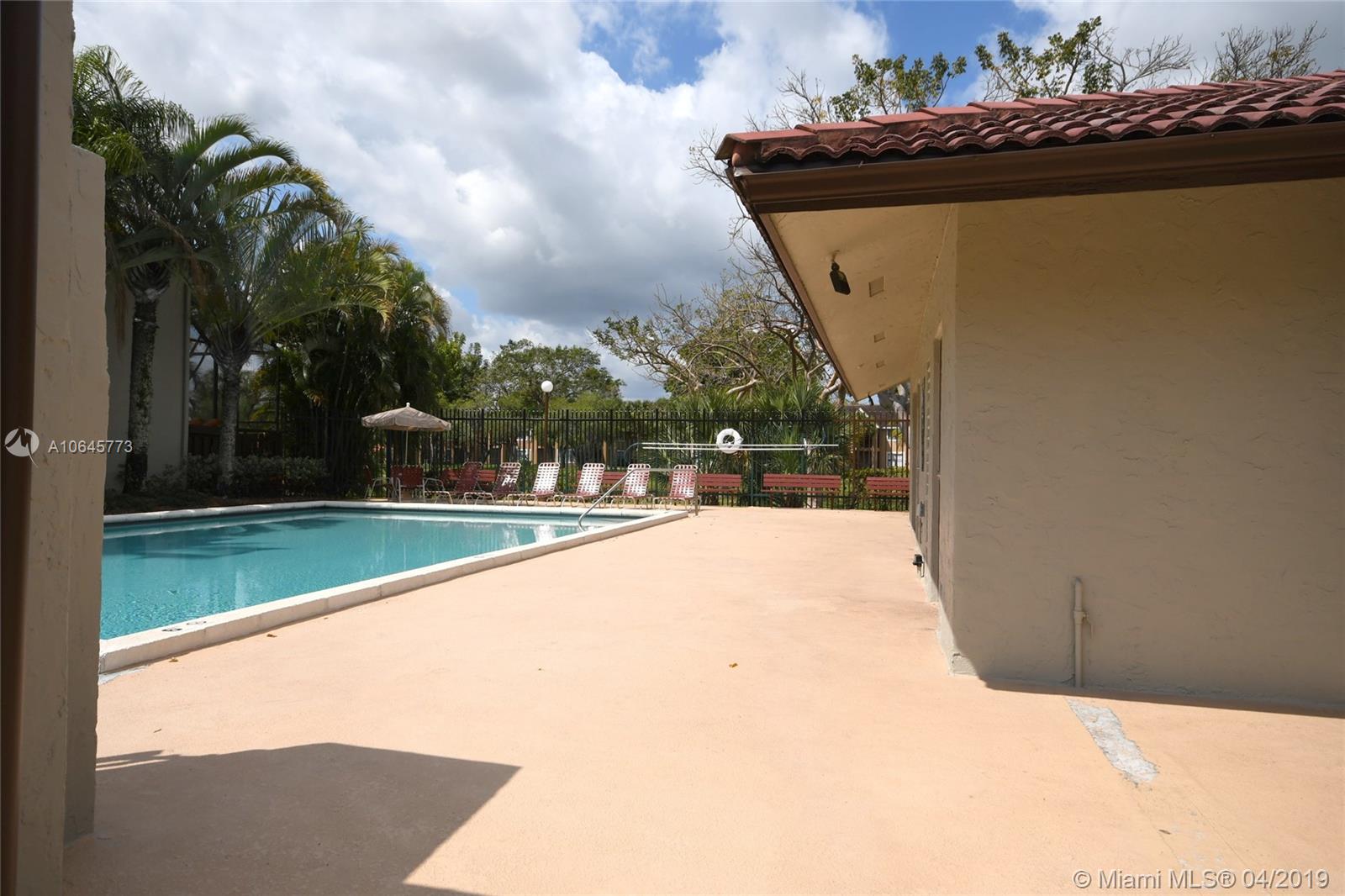 10475 Southwest 153rd Court, Unit 8 Miami, FL 33196 - Photo 58 of 65 Community Pool-Patio & Cabana area