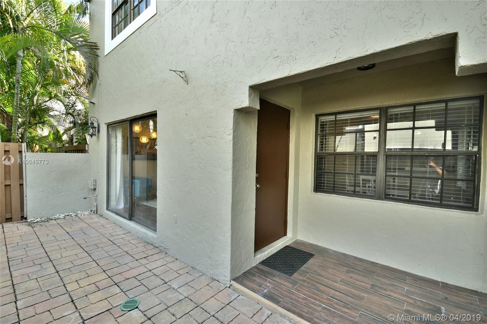 10475 Southwest 153rd Court, Unit 8 Miami, FL 33196 - Photo 8 of 65 Front Covered Courtyard Entry