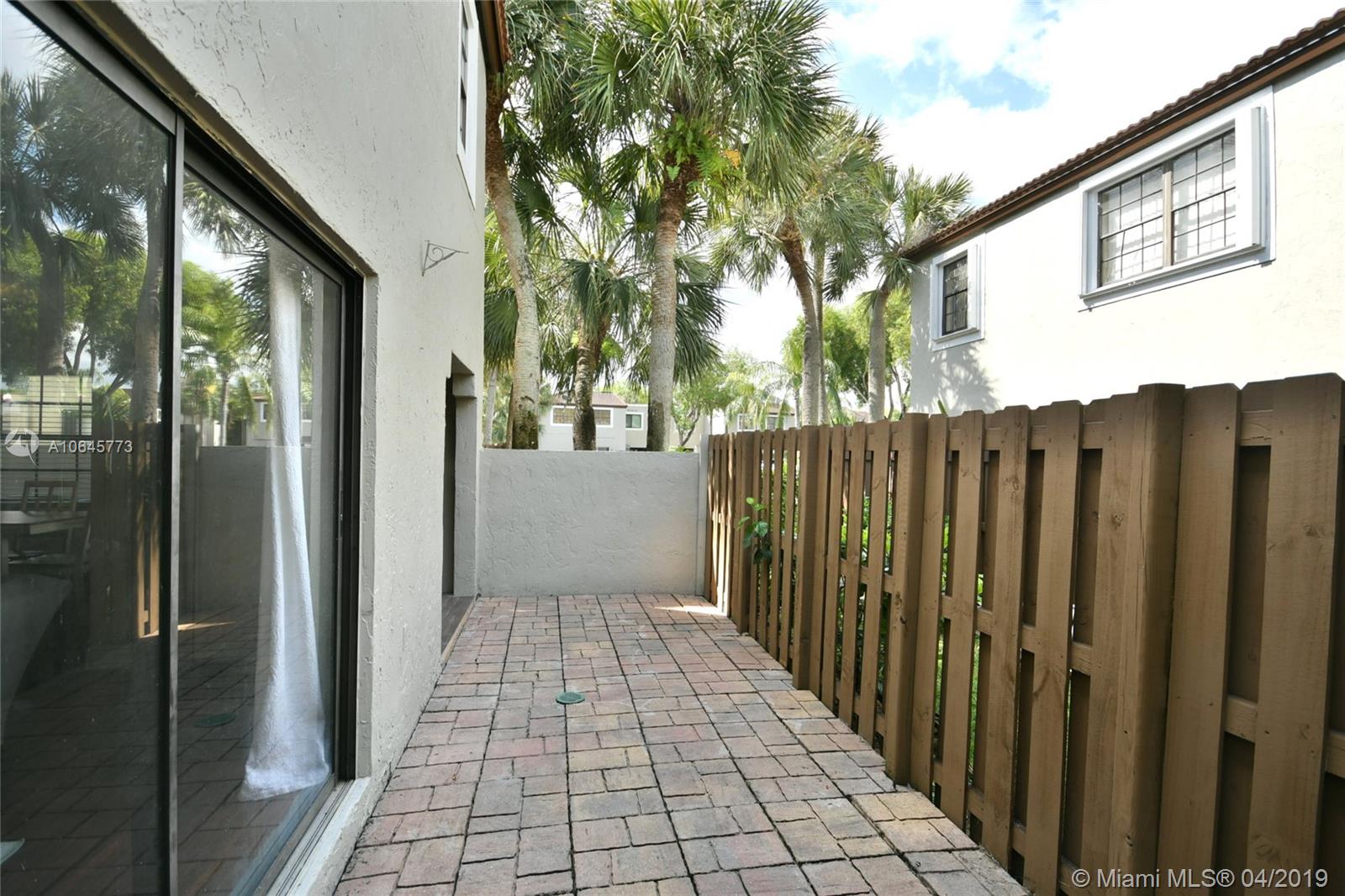 10475 Southwest 153rd Court, Unit 8 Miami, FL 33196 - Photo 10 of 65 Side Courtyard